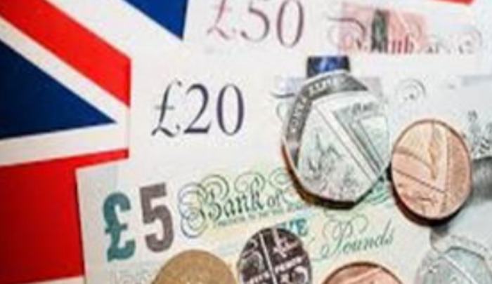 Sterling, US fall near parity, British Prime Minister's tax cuts continue